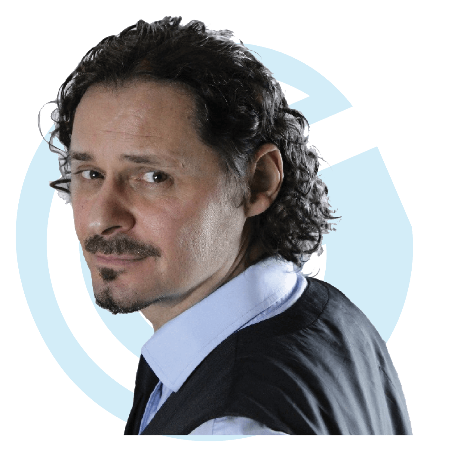 Professional-looking man with curly dark hair and a light blue shirt paired with a black vest. The background features a stylized blue circular design.